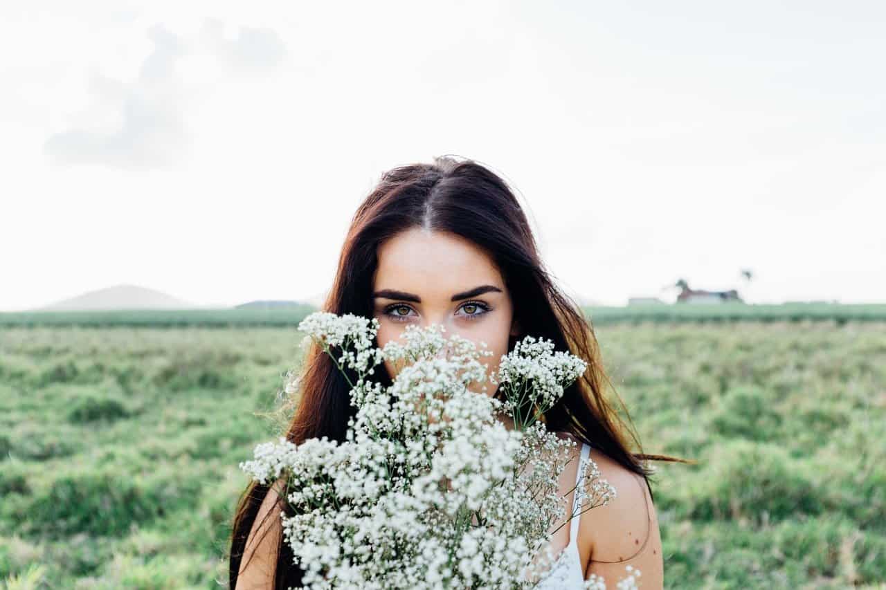 A woman standing in a field