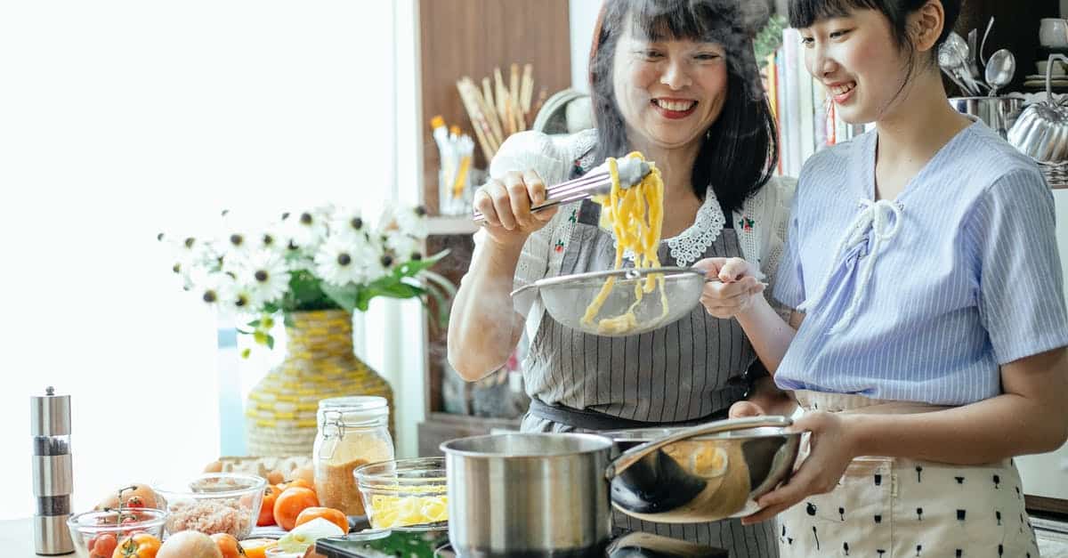 A woman preparing food in a bowl