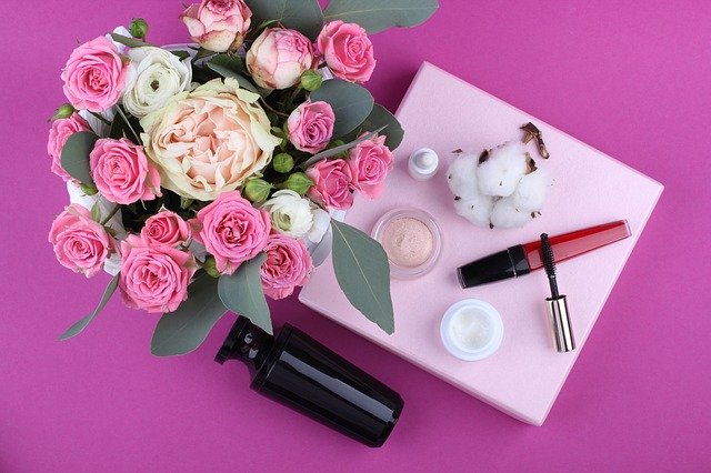 A pink flower on a table