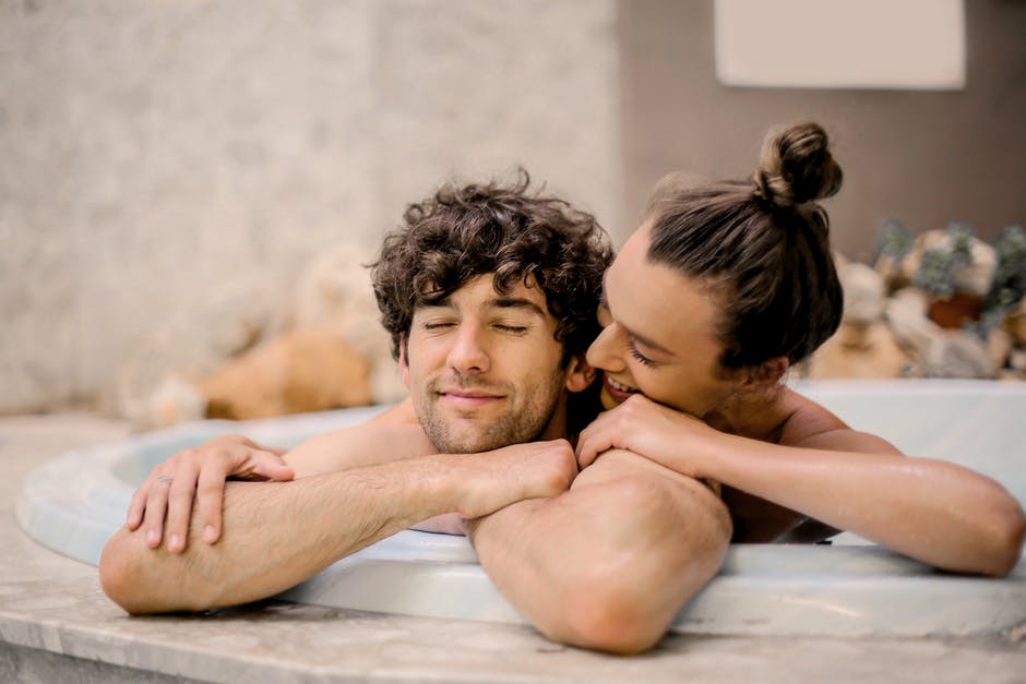 A person sitting on a bed