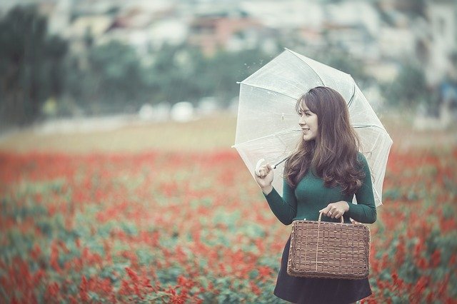 A woman standing in the grass