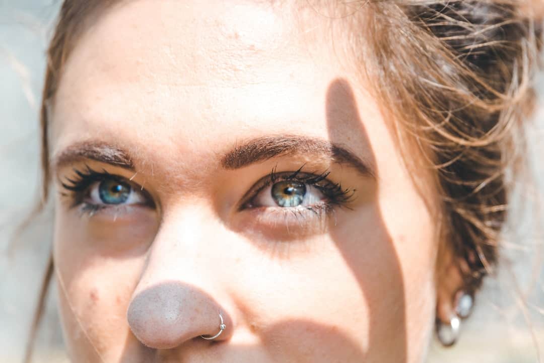 A close up of a person wearing glasses